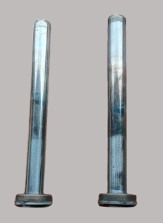 Damaged industrial shock absorber rods before repair